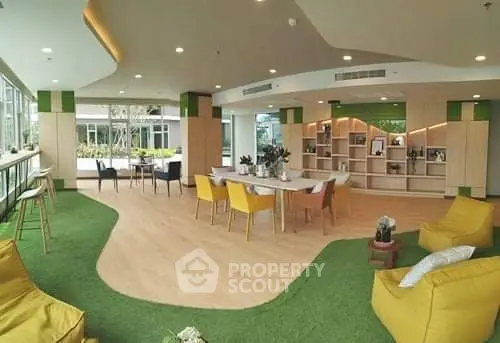 Modern and spacious living area with stylish decor and ample natural light.