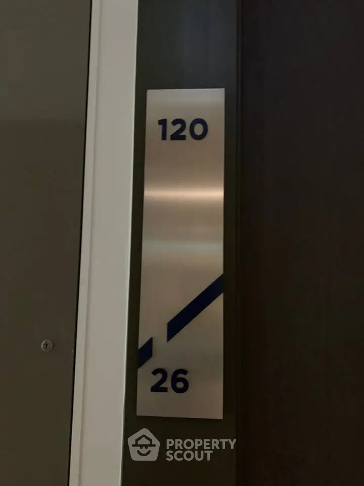 Modern elevator floor indicator in a sleek residential building