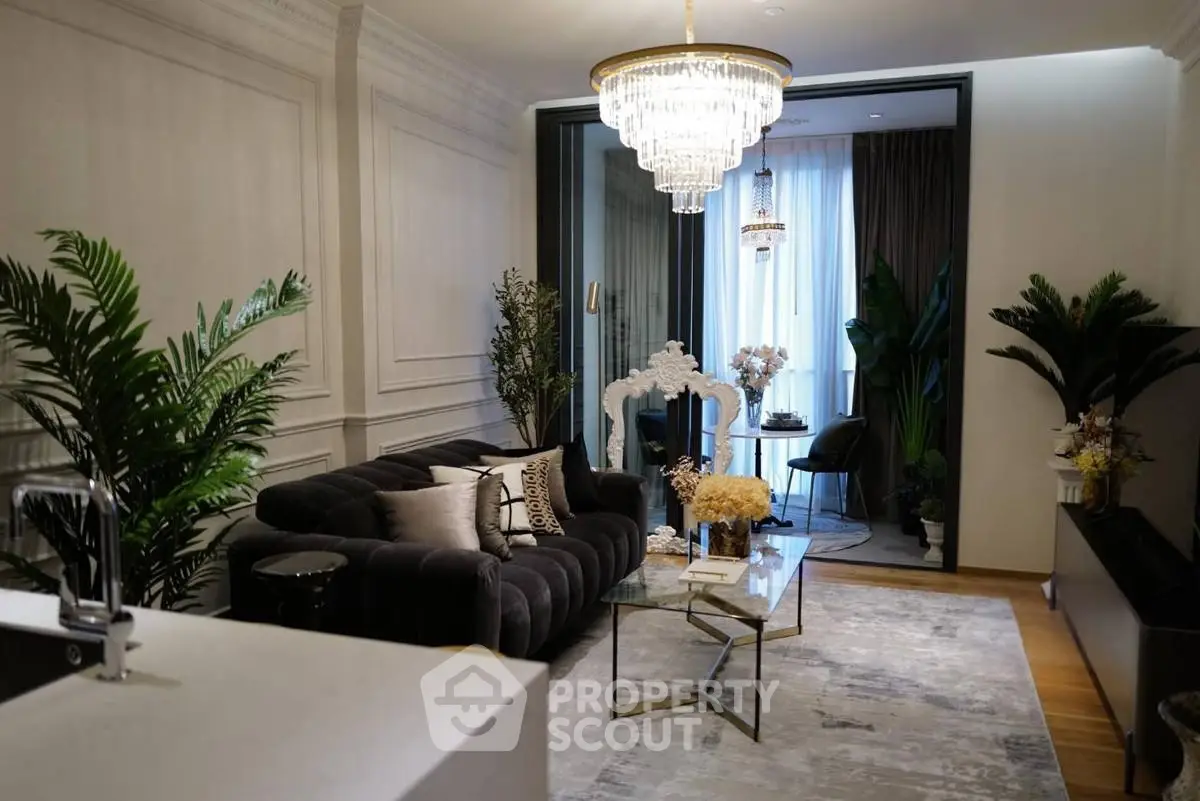 Luxurious living room with elegant chandelier and stylish decor