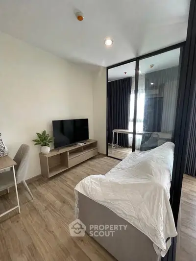 Modern living room with glass partition and stylish decor