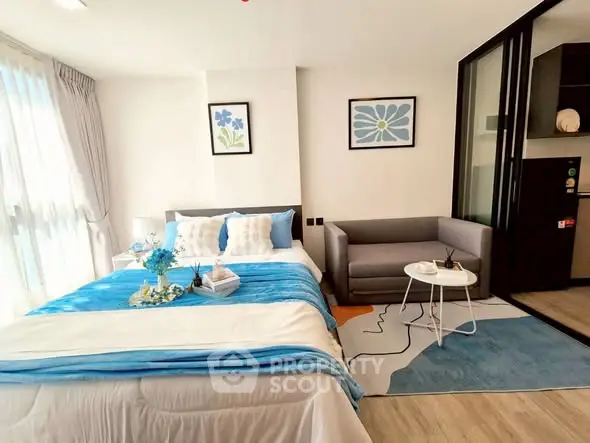 Modern bedroom with stylish decor and natural light