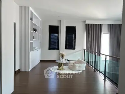 Spacious modern living area with elegant decor and natural light