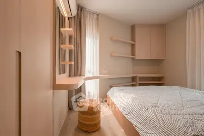 Modern bedroom with stylish wooden furniture and natural light