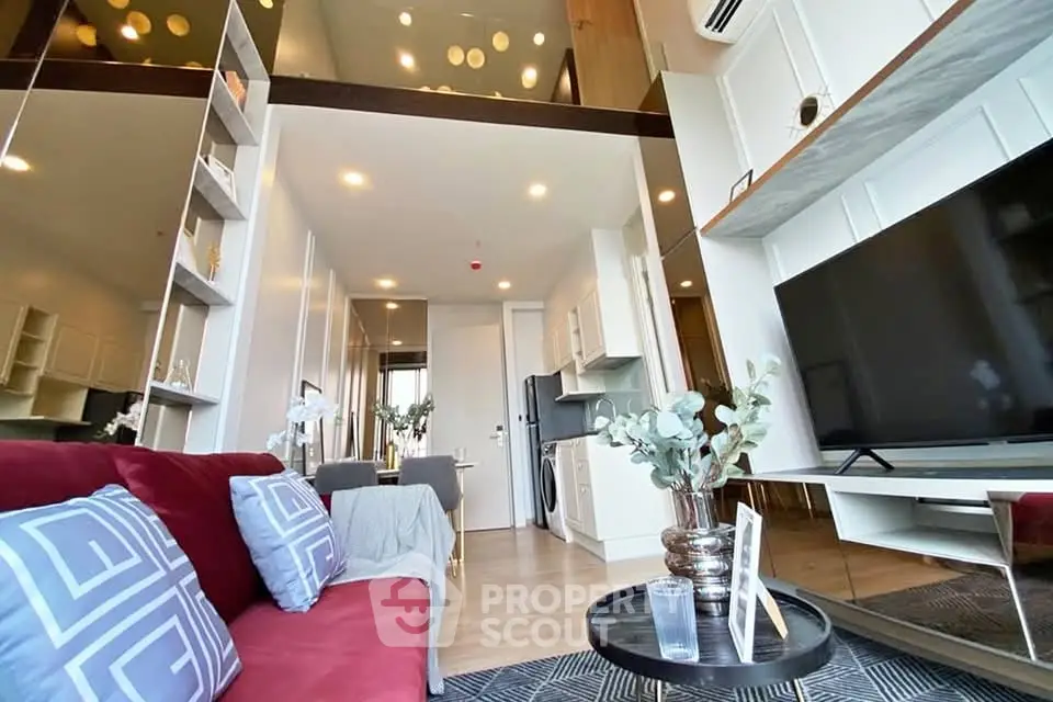 Modern living room with high ceiling and stylish decor in a luxury apartment