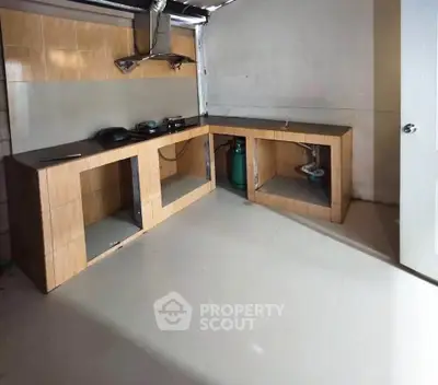 Spacious kitchen with modern cabinetry and ample counter space