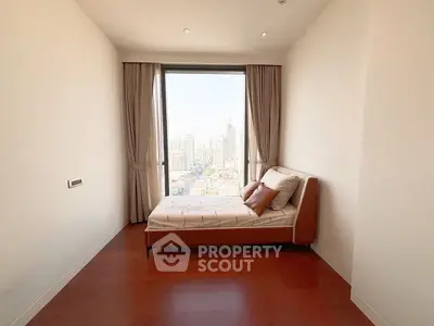 Minimalist bedroom with stunning city view through large window