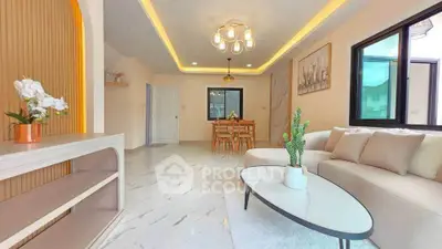 Spacious modern living room with elegant decor and natural light