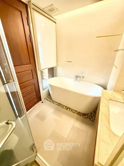 Luxurious bathroom with elegant freestanding bathtub and modern fixtures