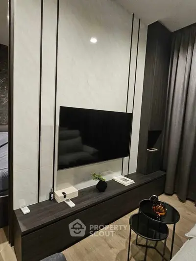 Modern living room with sleek TV setup and stylish decor