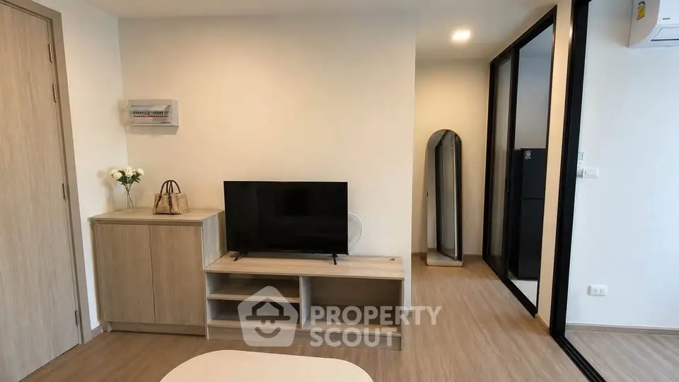 Modern living room with sleek TV stand and stylish decor