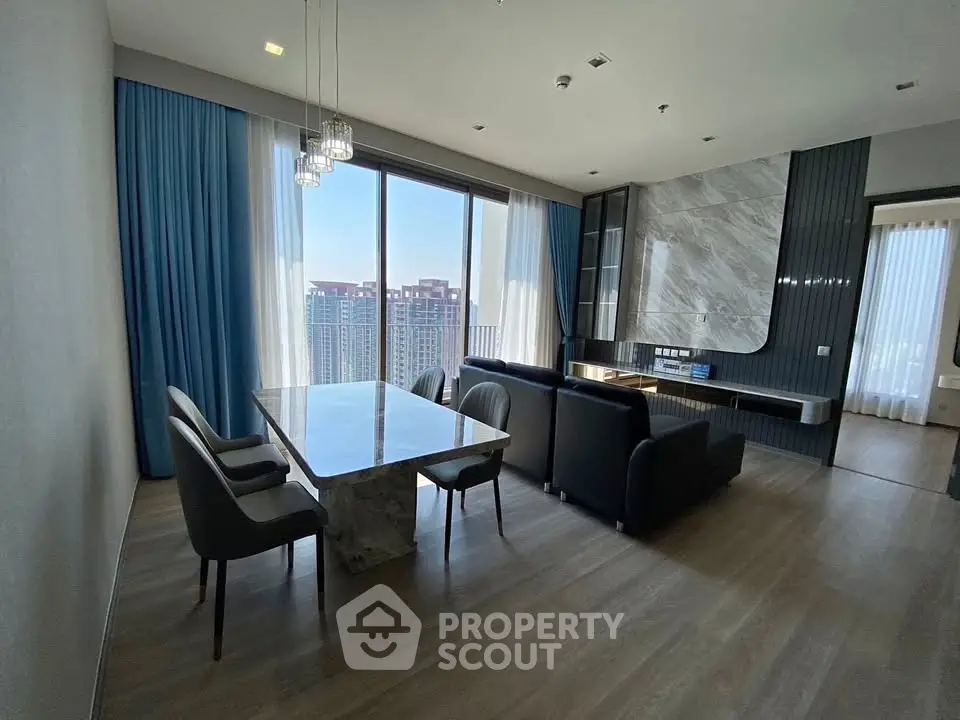 Luxurious modern living room with elegant marble dining table and panoramic city view.