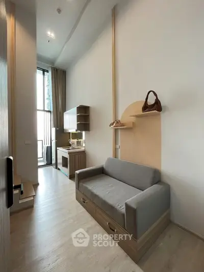 Modern studio apartment with open layout and stylish furniture