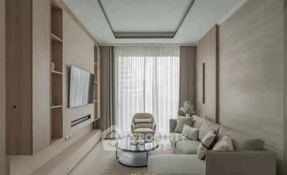 Modern living room with sleek design, large window, and comfortable seating.