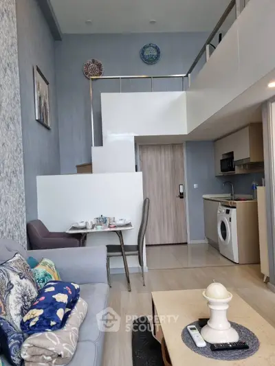 Modern duplex apartment with stylish decor and in-unit washing machine