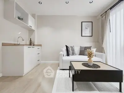 Modern living room with open kitchen, stylish decor, and natural light