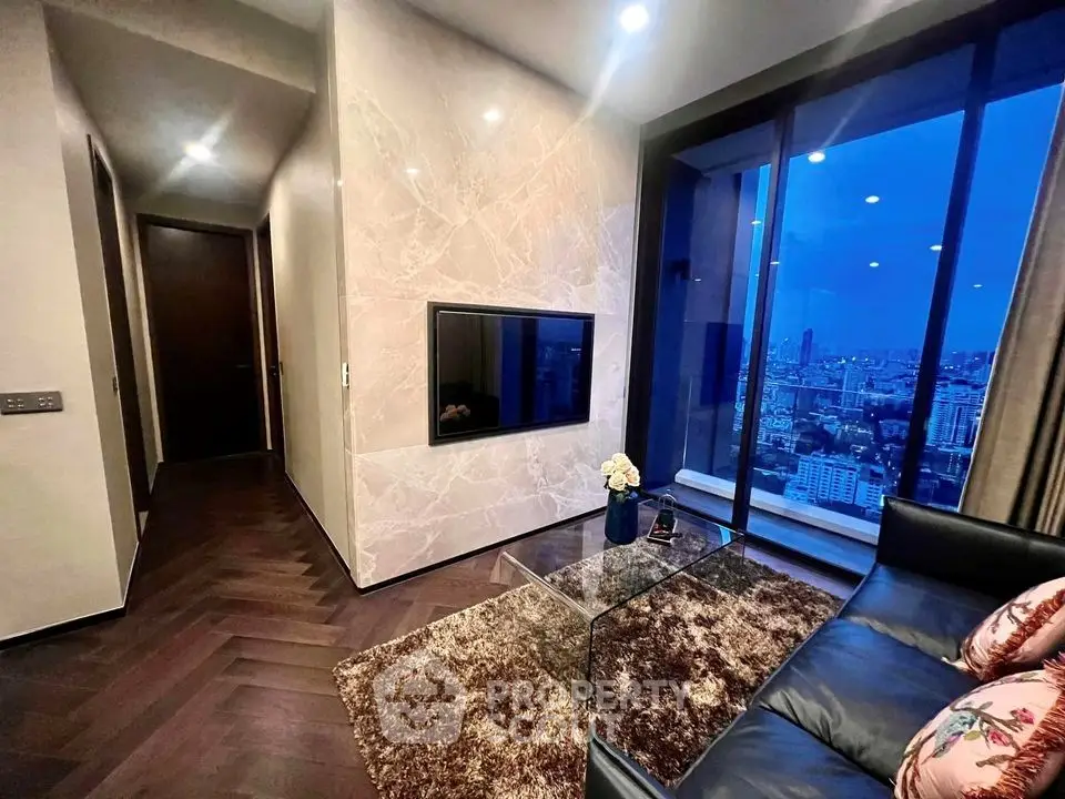 Luxurious living room with stunning city view, elegant decor, and modern amenities in high-rise apartment.