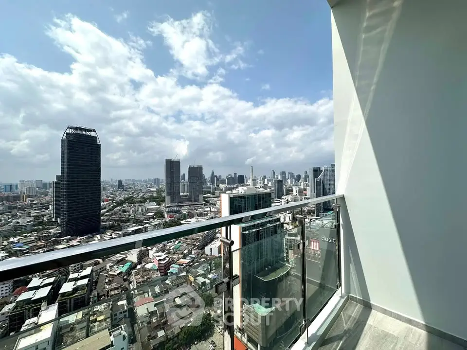 Stunning cityscape view from a modern high-rise balcony, perfect for urban living enthusiasts.