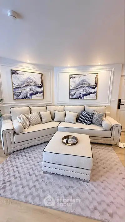 Elegant living room with stylish sectional sofa and modern art decor