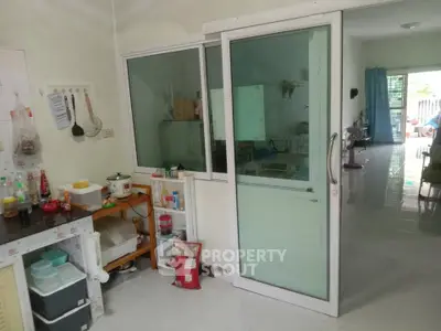 Spacious kitchen with closed layout and modern appliances