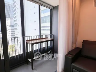 Modern apartment with floor-to-ceiling windows and sleek interior design