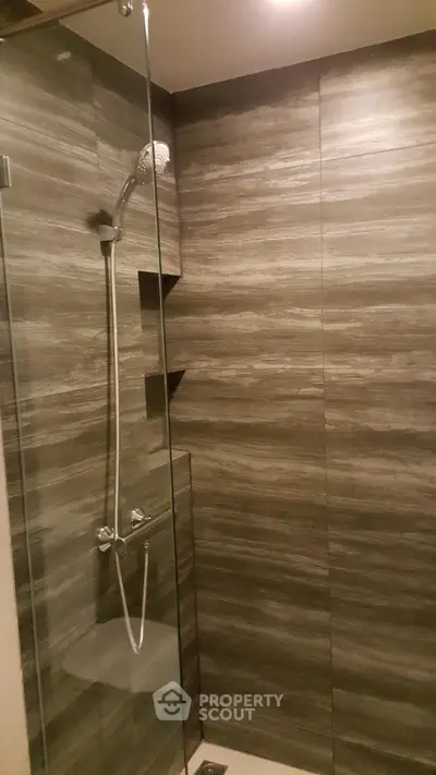 Modern bathroom with sleek shower design and elegant tile work