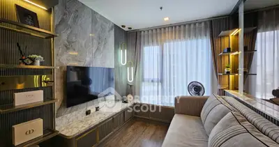 Luxurious modern living room with elegant decor and large window view