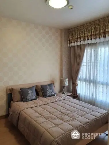 Cozy and inviting bedroom with a large comfortable bed, elegant curtains, and soft lighting, perfect for relaxation and tranquility.