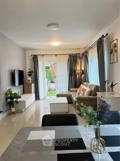 Modern living room with elegant decor and natural light