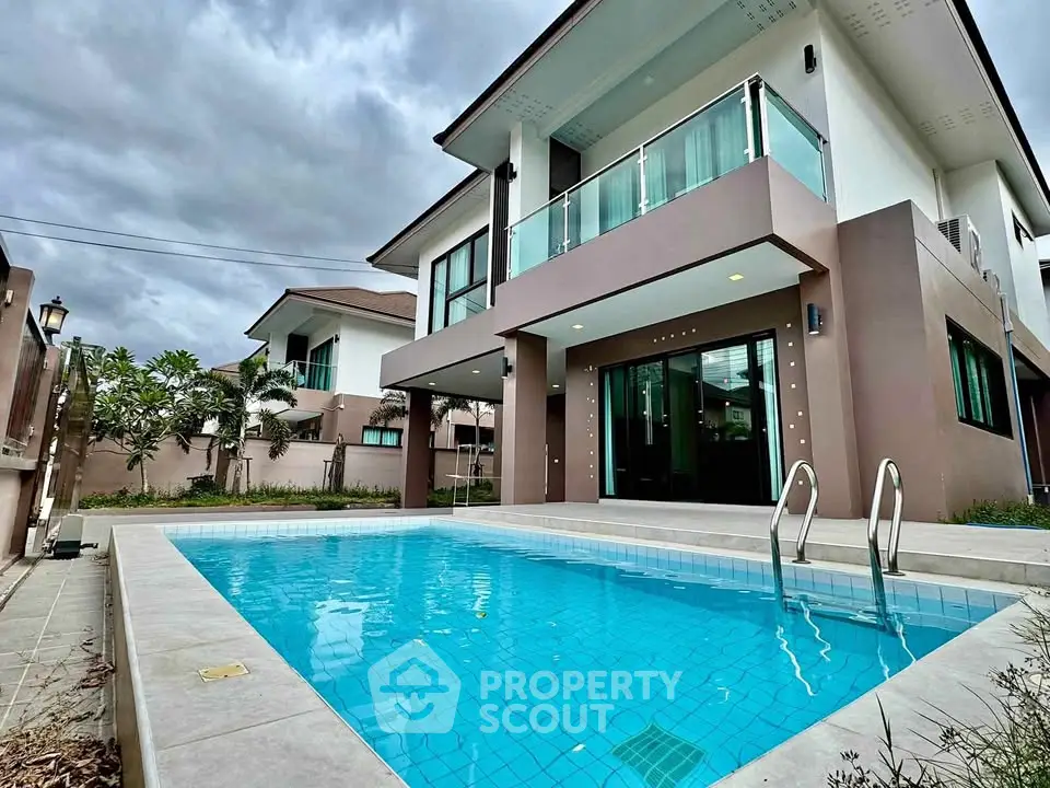 Luxurious modern villa with private pool and elegant balcony, perfect for upscale living.