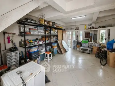 Spacious storage room with organized shelves and ample natural light