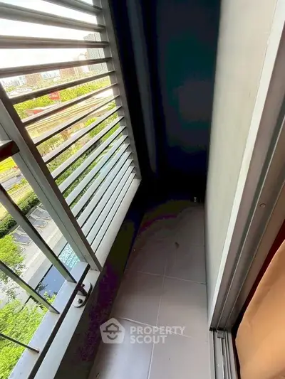 Modern balcony with sleek design and city view, perfect for urban living.
