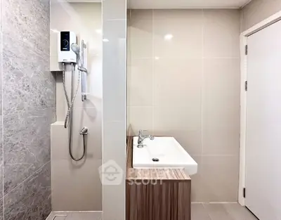Modern bathroom with sleek shower and stylish sink design