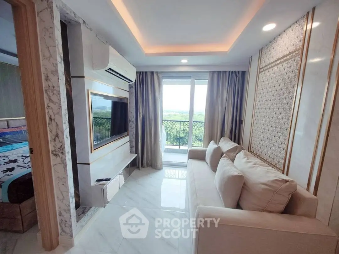 Luxurious living room with modern decor and stunning balcony view