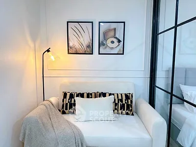 Cozy living room corner with stylish decor and comfortable seating
