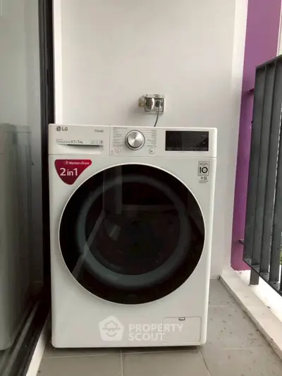 Modern balcony with LG washer dryer combo, perfect for urban living convenience.