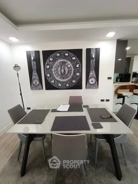 Modern dining area with stylish decor and sleek furniture