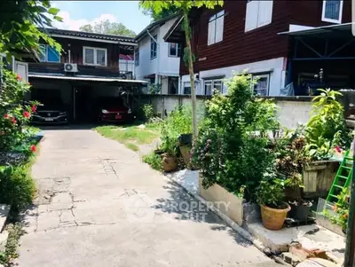 Charming residential property with lush garden and spacious driveway, perfect for family living.