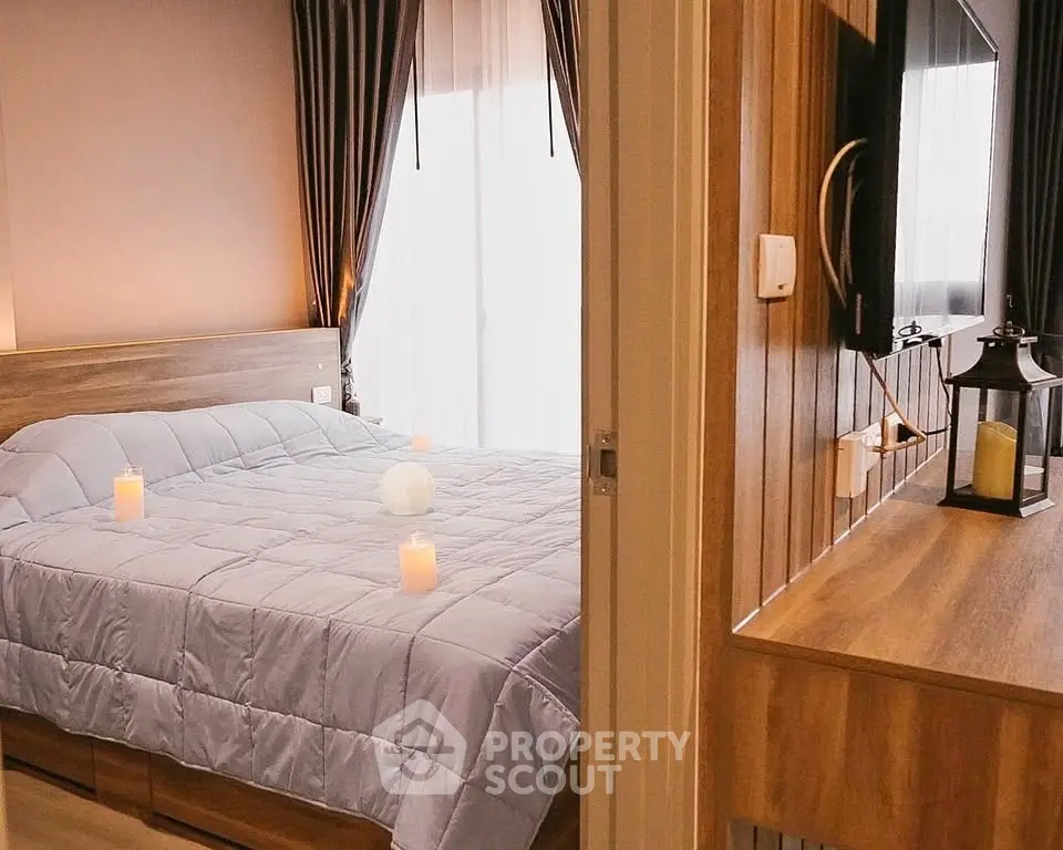 Cozy bedroom with soft lighting and elegant decor, featuring a comfortable bed and stylish wooden accents.