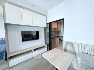 Modern apartment interior with sleek kitchen and cozy living area