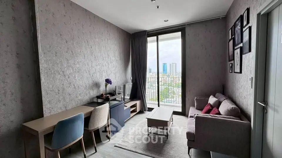 Modern living room with city view, stylish furniture, and natural light.