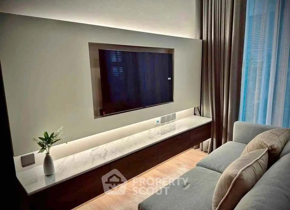 Modern living room with sleek TV setup and elegant decor