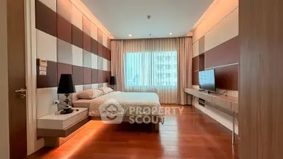 Luxurious modern bedroom with stylish decor and large window view