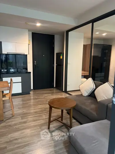 Modern living room with open layout and stylish furniture in a contemporary apartment.