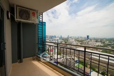 Spacious balcony with stunning city view in modern high-rise apartment