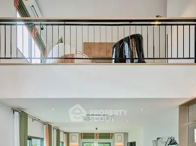 Spacious modern living room with high ceiling and stylish mezzanine