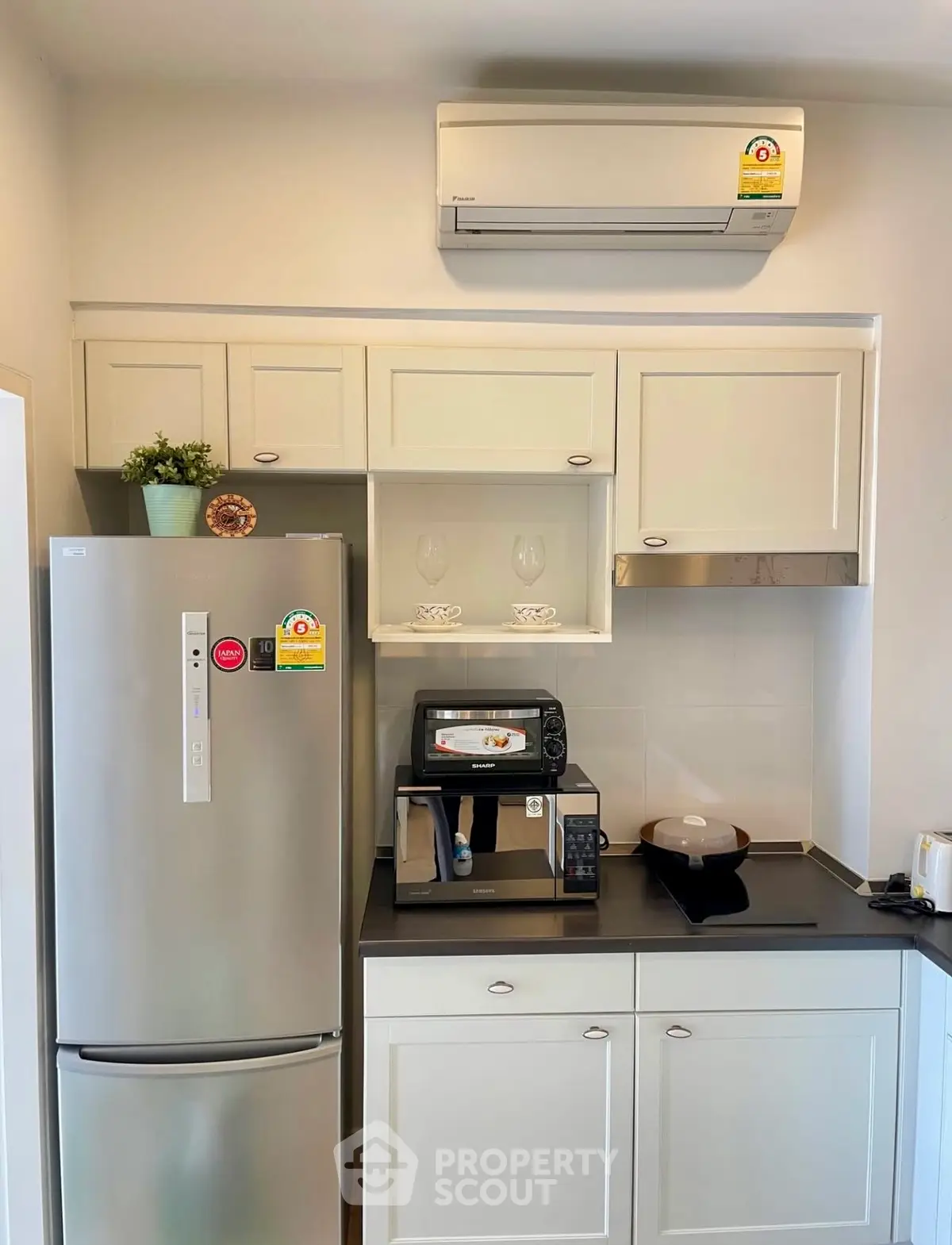Modern kitchen with sleek appliances and stylish cabinetry