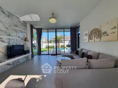 Luxurious living room with modern decor and garden view