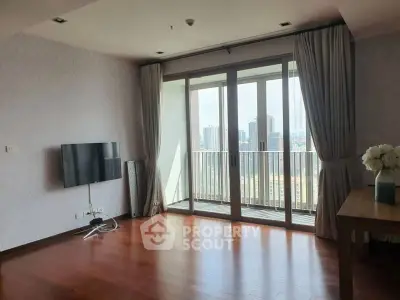 Spacious living room with city view and modern decor