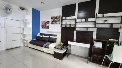 Modern living room with sleek shelving and stylish decor