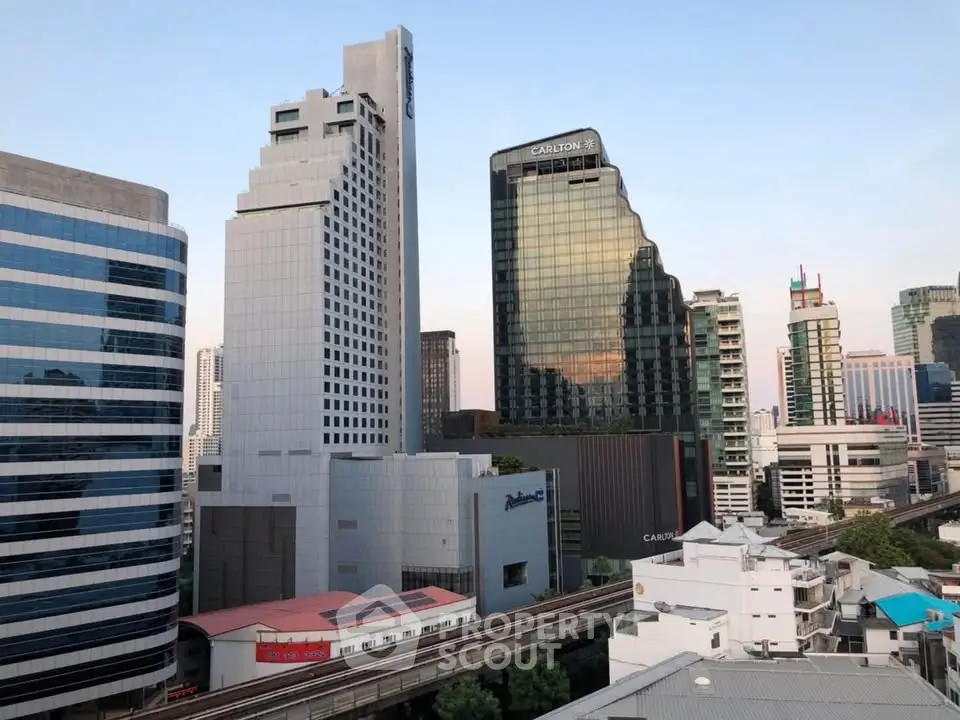 Stunning cityscape view showcasing modern high-rise buildings in a bustling urban environment.